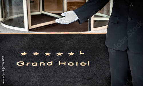 Hotel concierge showing the way