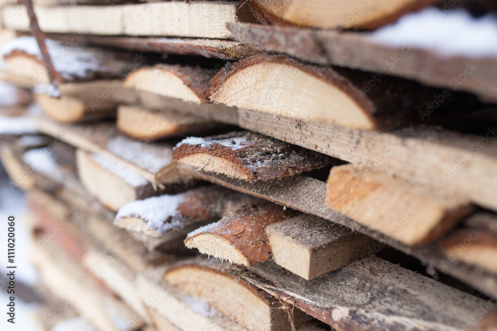 firewood in the snow in the winter firewood in the snow in the winter