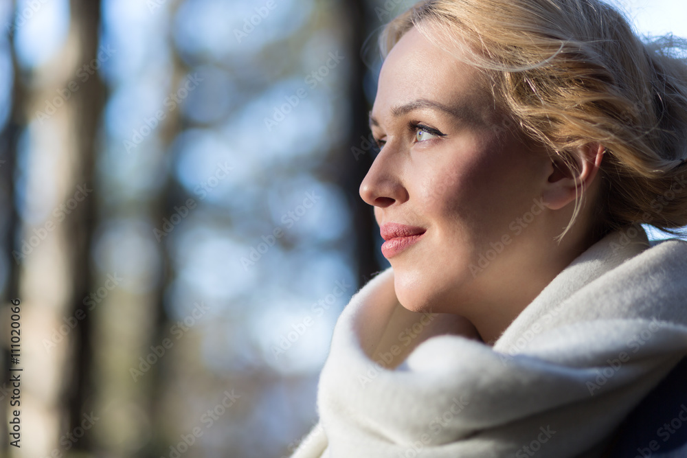 Portrait of beautiful young woman walking outdoors in autumn Portrait of beautiful young woman walking outdoors in autumn