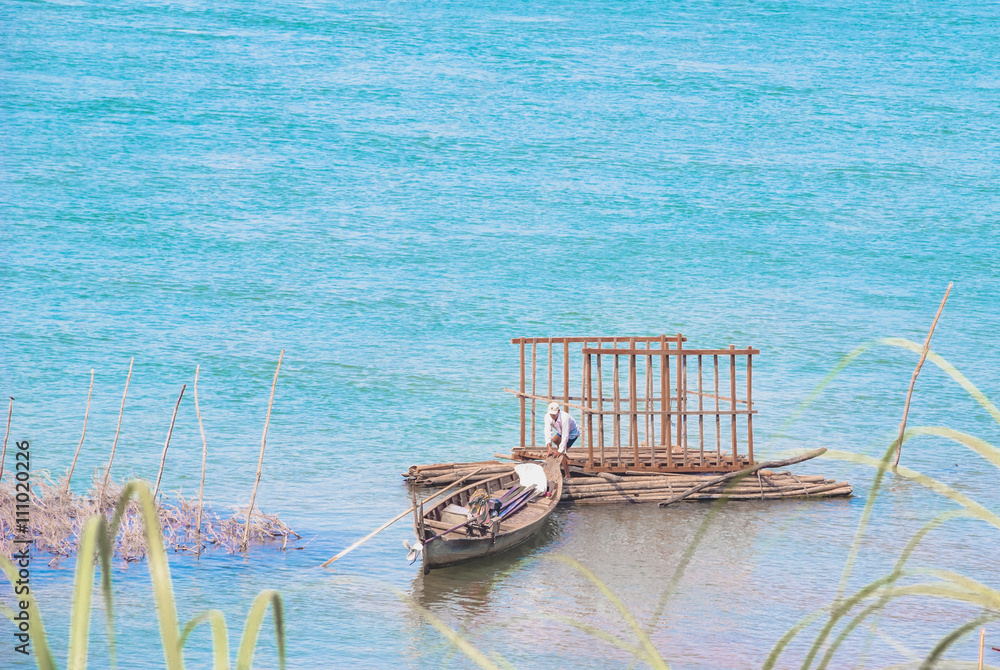 Man working on the river Man working on the river