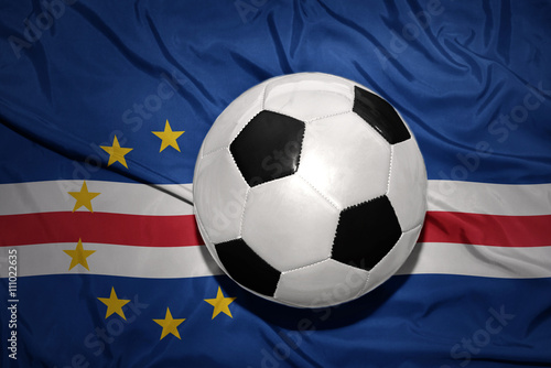 black and white football ball on the national flag of cape verde