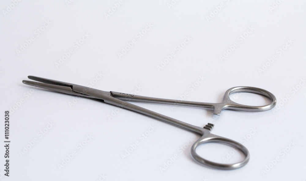 surgical instruments and tools including , forceps and tweezers White background surgical instruments and tools including , forceps and tweezers White background