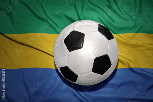 black and white football ball on the national flag of gabon