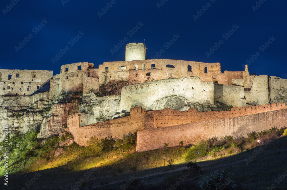 walls of old castle in night lights
