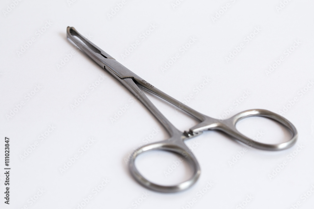surgical instruments and tools including , forceps and tweezers White background surgical instruments and tools including , forceps and tweezers White background