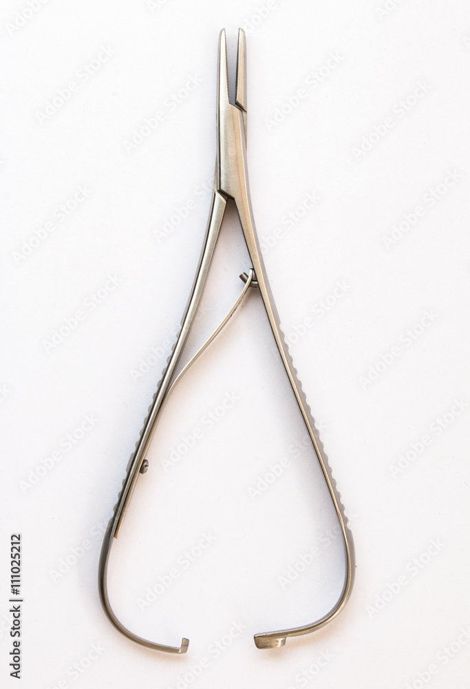 surgical instruments and tools including , forceps and tweezers White background surgical instruments and tools including , forceps and tweezers White background