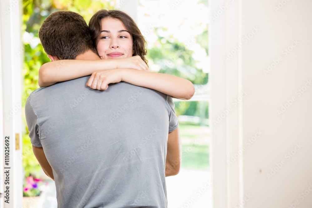 Young couple embracing each other