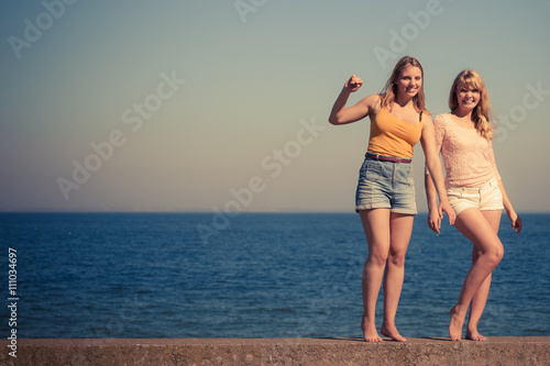 Two women best friends having fun outdoor