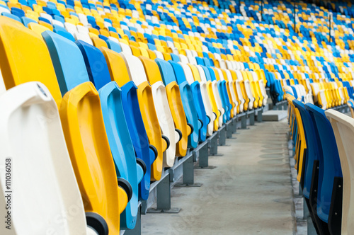 Empty plastic seats in a footbal or soccer stadium. 2016 sport background © bychykhin