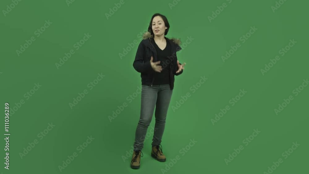 caucasian girl with winter jacket isolated on green screen talking interview caucasian girl with winter jacket isolated on green screen talking interview