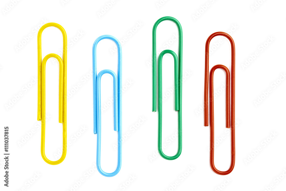 four paper clips on white background four paper clips on white background