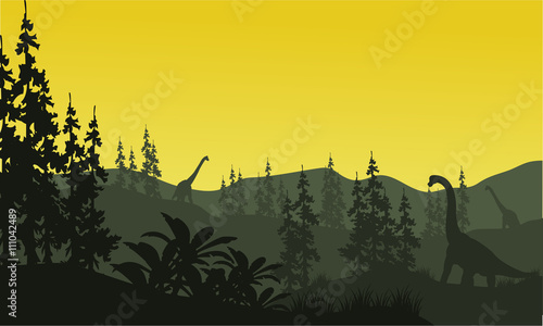 Silhouette of brachiosaurus and spruce