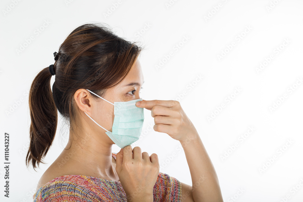 .Pollution mask ,asian woman push protection mask wearing for pr .Pollution mask ,asian woman push protection mask wearing for pr