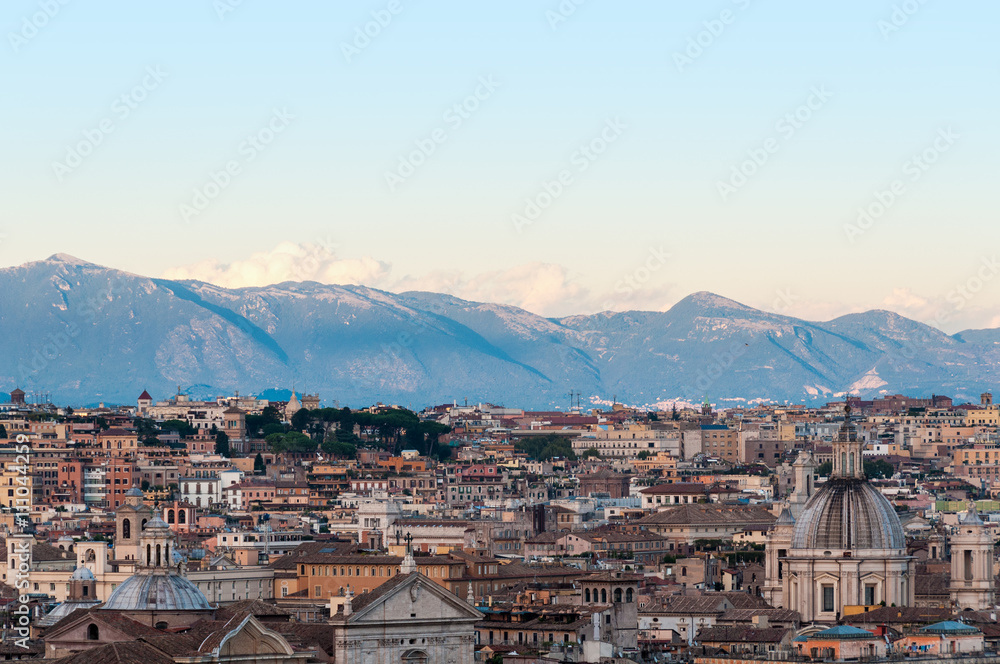 Aerial view of Rome downtown with mountains on the background