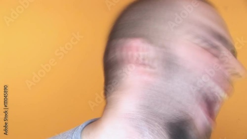 Crazy man shaking his head and going mad 
