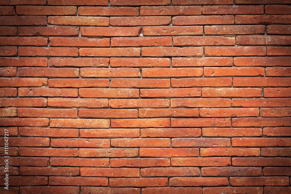 Fototapeta premium Orange brick wall. brick texture. brick pattern. Part of brick wall.