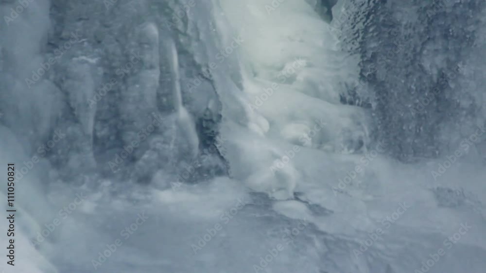 Ice surface. Water flowing under transparent ice. Winter background ...