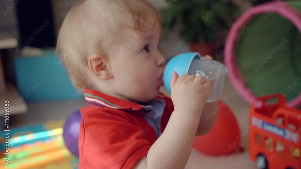Little boy drink water from bottle Little boy drink water from bottle