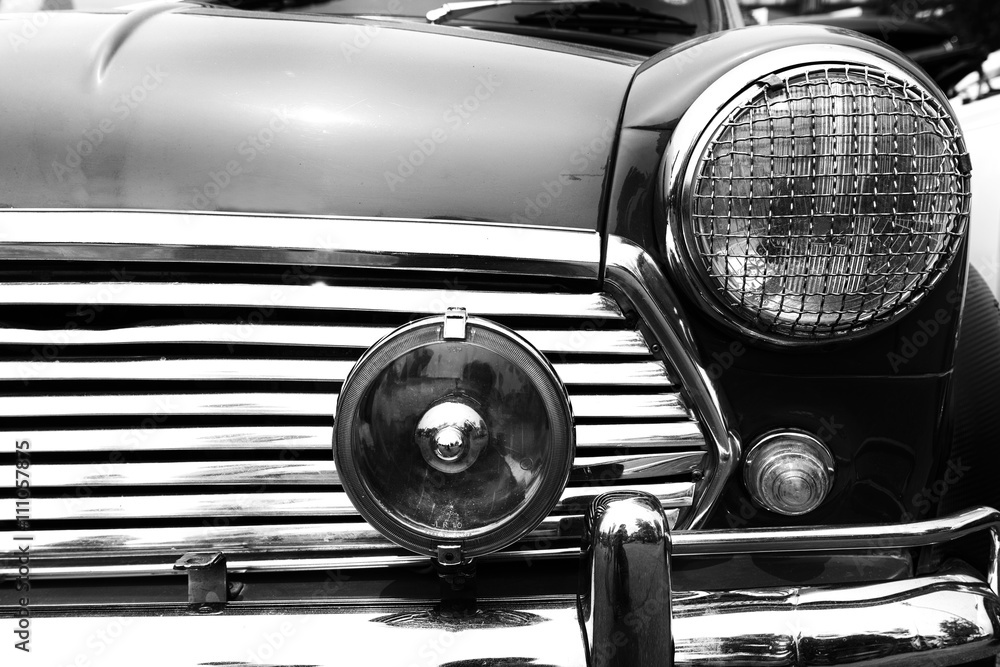 Black and white photo of classic car- vintage film grain filter effect styles