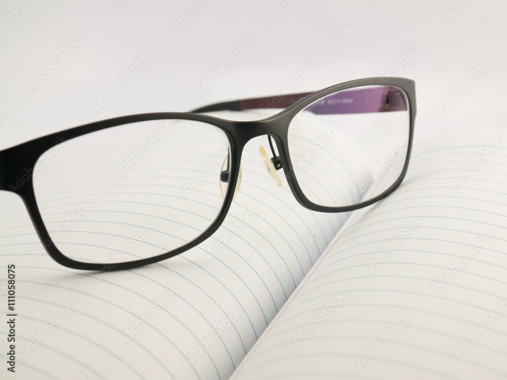 glasses on notebook