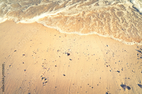 Sea summer abstract background. Golden sand beach with ocean waves. free space