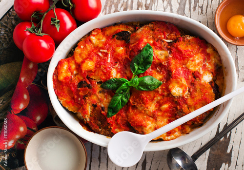 Εκτύπωση καμβά delicious parmigiana with raw ingredients on the table