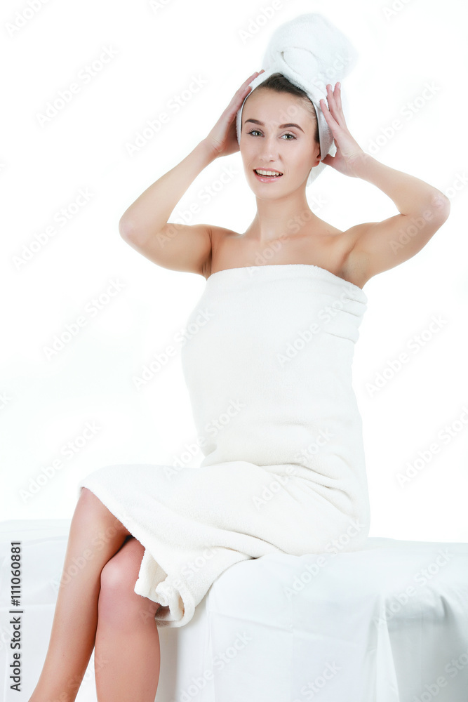 Beautiful young woman having a massage in a spa Beautiful young woman having a massage in a spa