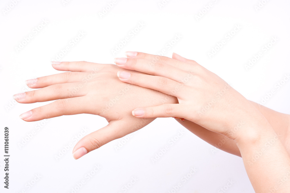 finger hand symbols isolated concept closeup shot of beautiful women hands applying hand cream on the white background