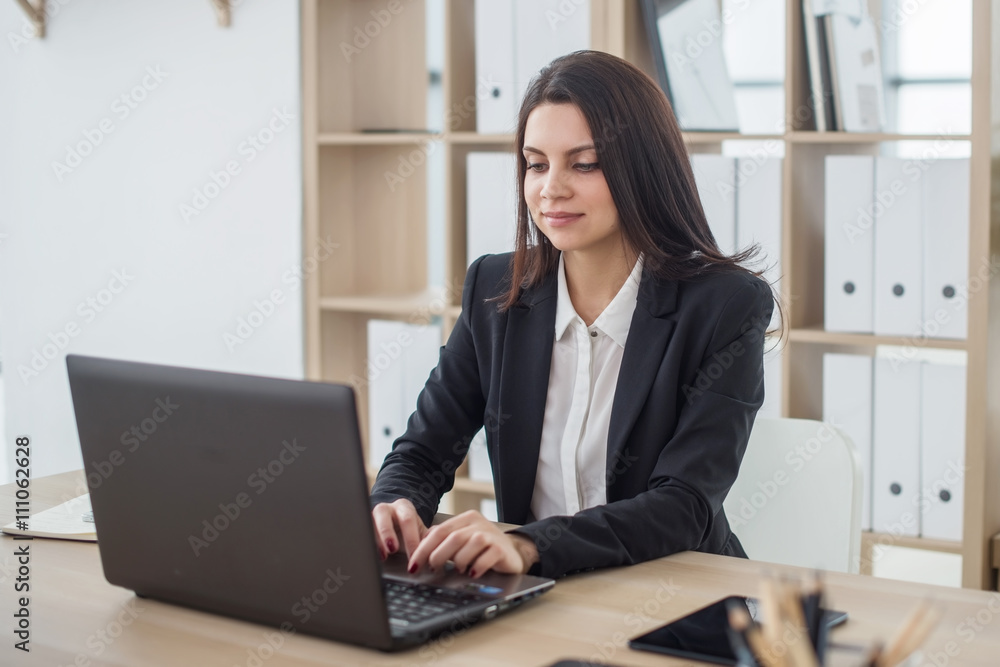Business woman with notebook in office, workplace Business woman with notebook in office, workplace