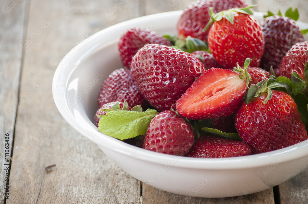 Appetizing strawberry in the bowl Appetizing strawberry in the bowl