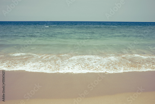 Ocean waves on the beach.