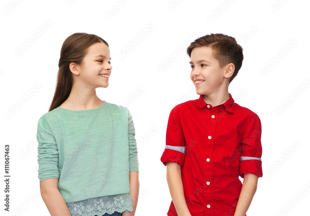 happy boy and girl looking at each other happy boy and girl looking at each other