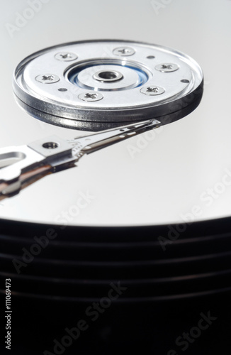 Close up of hard disk drive is a data storage device used for storing and retrieving digital information using rapidly rotating disks (platters) coated with magnetic material / hard disk drive