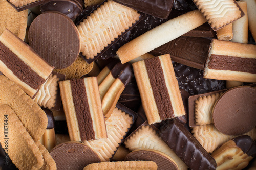 Wall Mural Cookies assorted on black background