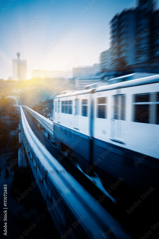 Naklejka premium metro monorail driving through tunnel