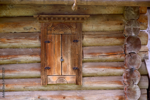 Fotomural Window in an wooden peasant house