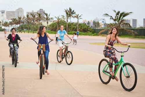Casual image of a family riding their bicycles together