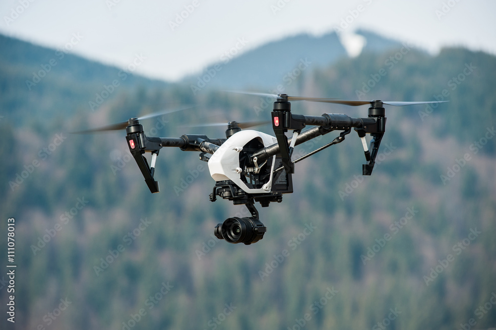 drone with high resolution digital camera White drone with digital