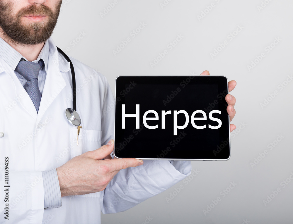 technology, internet and networking in medicine concept - Doctor holding a tablet pc with herpes sign. Internet technologies in medicine technology, internet and networking in medicine concept - Doctor holding a tablet pc with herpes sign. Internet technologies in medicine