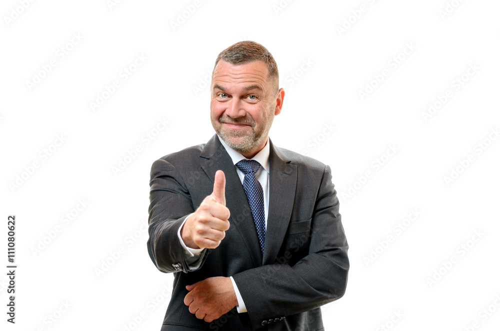 Enthusiastic businessman giving a thumbs up Enthusiastic businessman giving a thumbs up