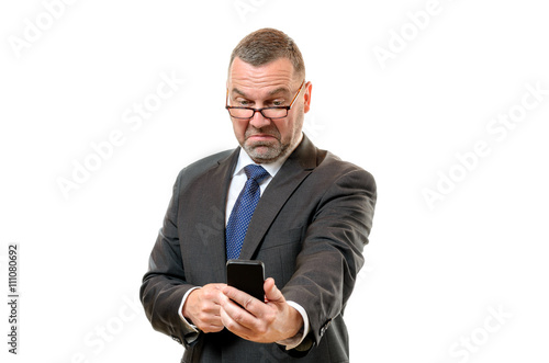 Fotografie Businessman pulling disdainful face