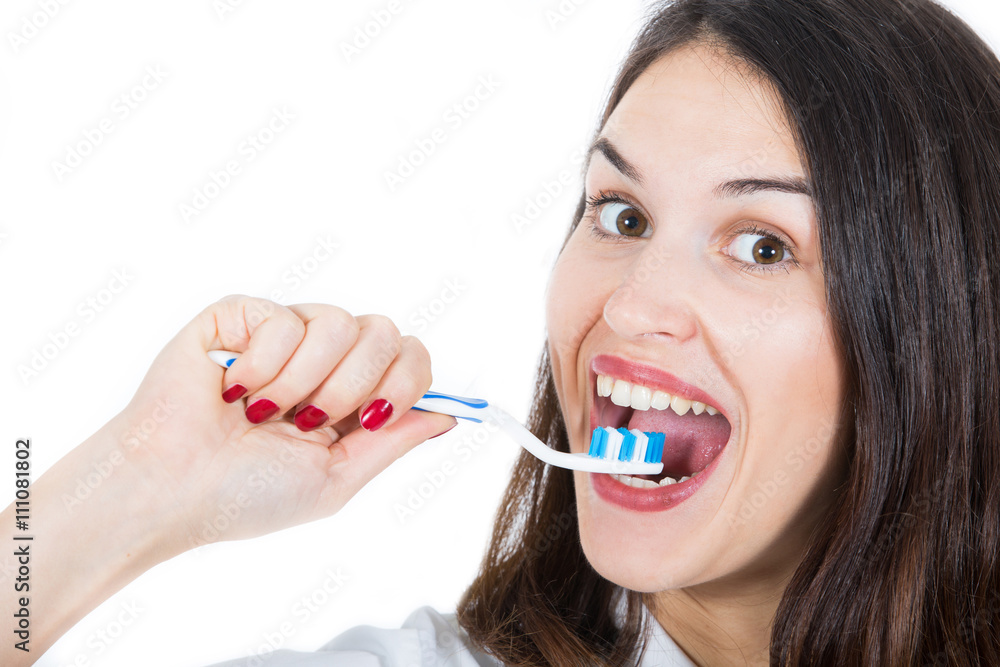 young woman with toothbrush isolated on white young woman with toothbrush isolated on white