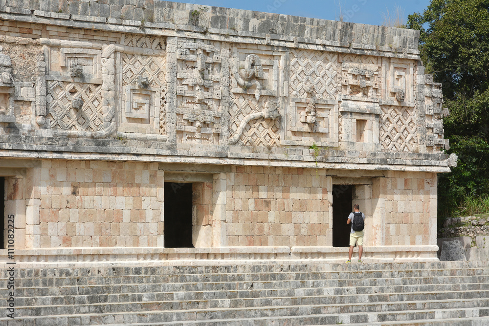Man see of the nunnery building in Uxmal. Mexico.