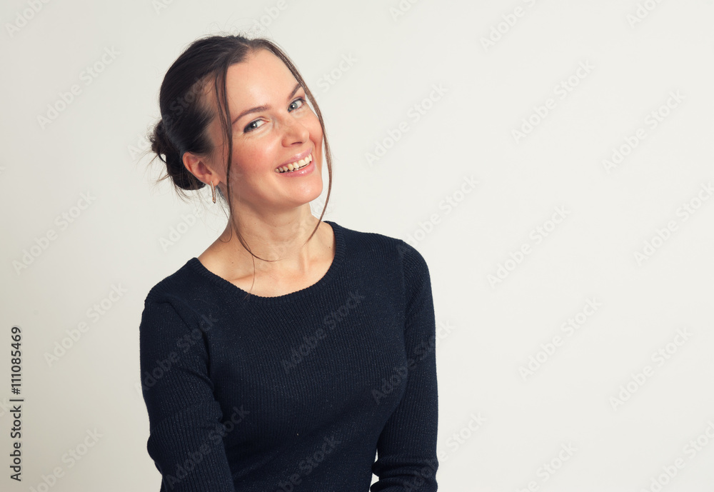 smiling brunette woman looking at camera smiling brunette woman looking at camera