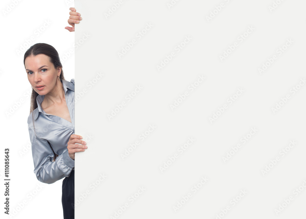 Pretty brunette woman holding blank presentation board Pretty brunette woman holding blank presentation board