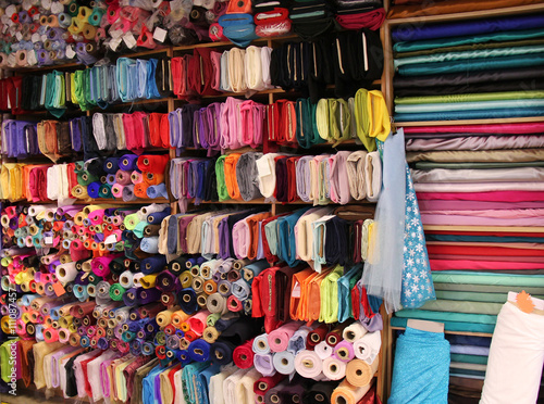 Photos A Variety of Materials for Sale at a Haberdashery Store.