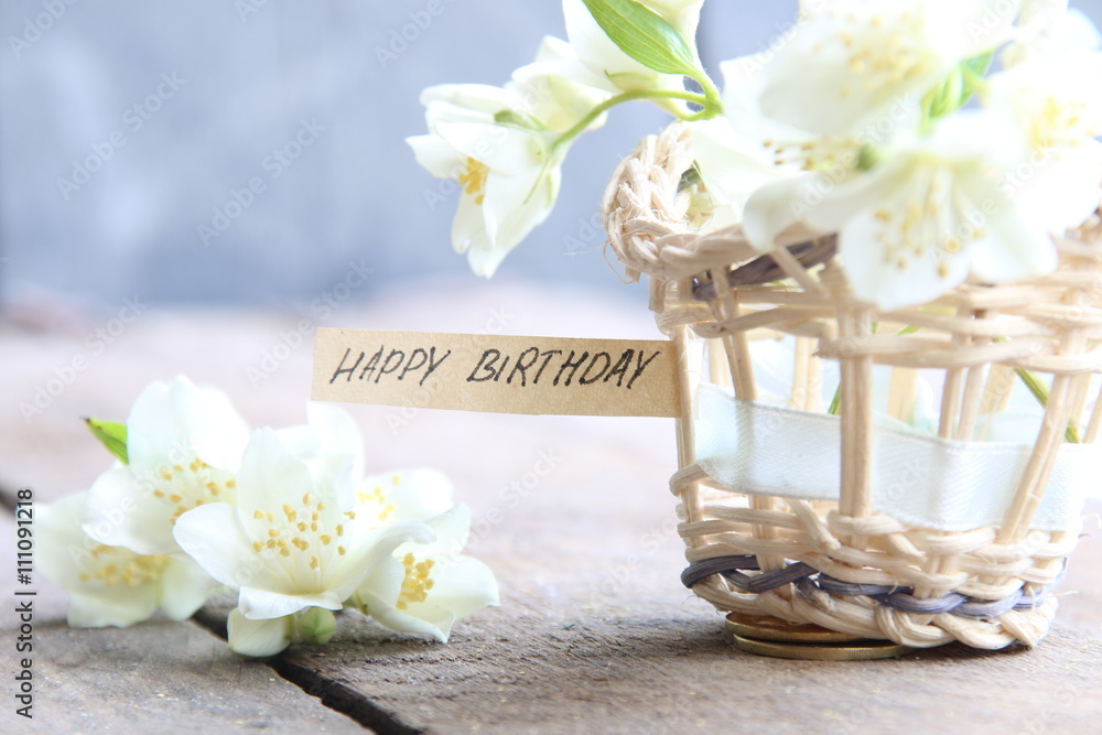 Fototapeta premium happy birthday text and flowers