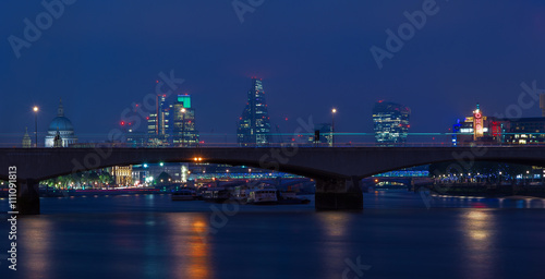 London cityscape at night including St  Paul   s Cathedral and Waterloo Bridge