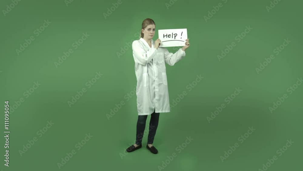 attractive caucasian girl with lab coat isolated on green need help with sign attractive caucasian girl with lab coat isolated on green need help with sign
