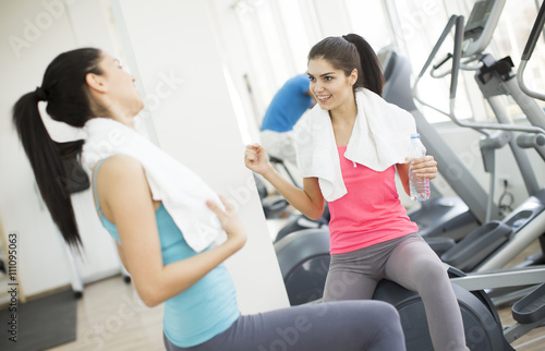 Two young women in the gym